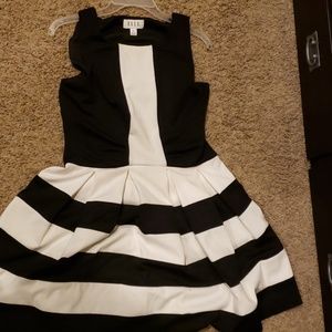 Black and white knee length dress